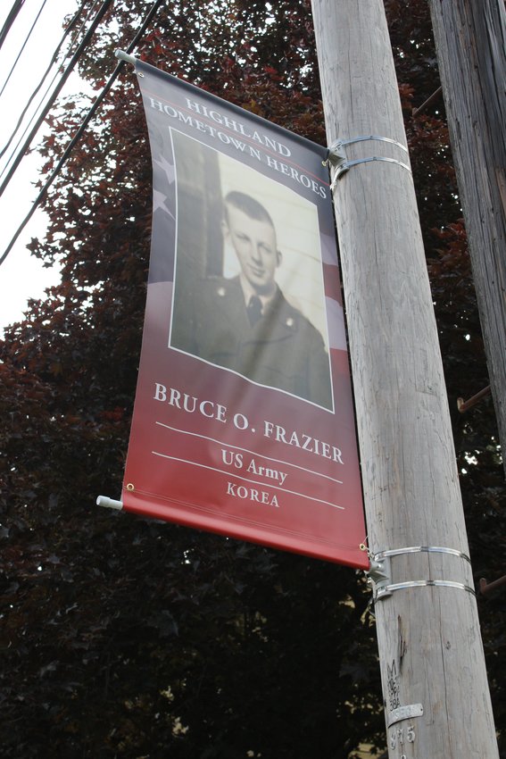 A banner honoring U.S Army veteran Bruce O. Fraizer